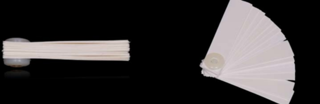 4 Essential Leaf Gauge Dental Techniques Explained A leaf gauge dental tool shown closed in a compact stack on the left and fanned open into a wide spread on the right.