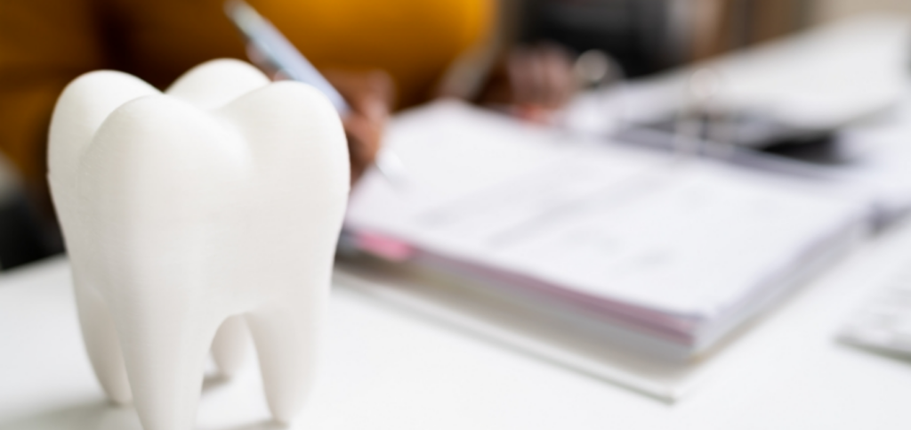 Dental practice manager documenting an OSHA dental workplace injury report