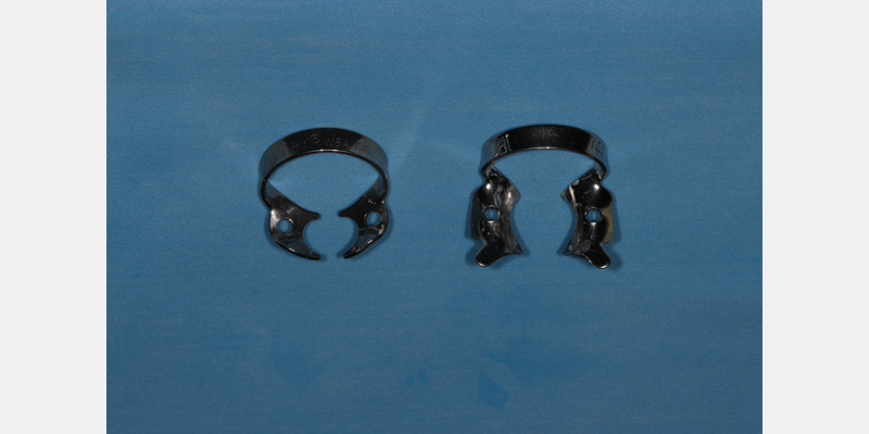 efrver Wingless W8A and winged 14A rubber dam clamps used for tooth isolation during restorative procedures