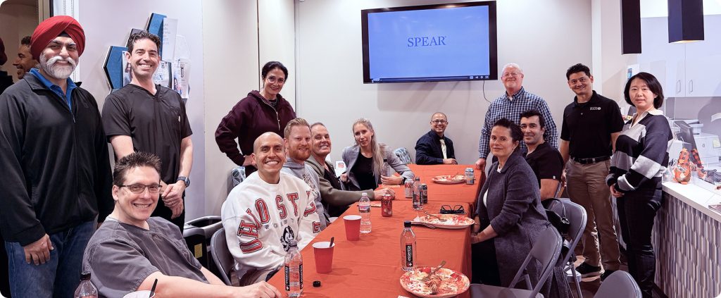 Dr. Don Anderson with members of an airway prosthodontic study club discussing interdisciplinary case planning.