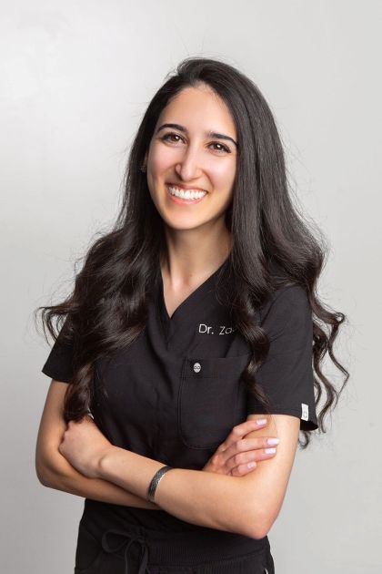 Leila Zadeh, DMD, smiling in a professional headshot, known for teaching in dentistry and clinical education