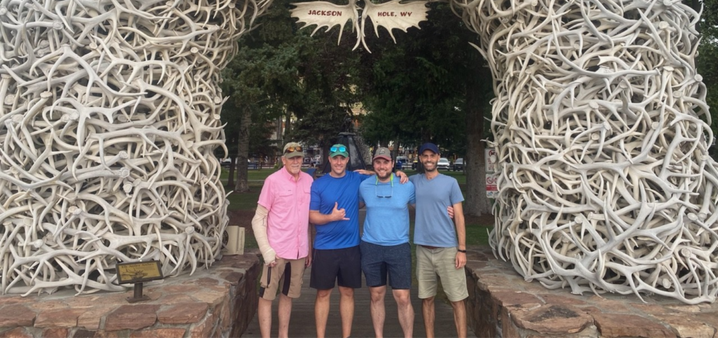 Dr. Andy Janiga, Dr. Steve Ratcliff, and fellow Grasshopper Study Club members reuniting in Jackson Hole, Wyoming, a yearly tradition that keeps their dental mentorship connections with new dentists active.